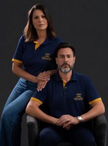 Alinne Da Cunha and Marco Souza, Owners of XPRO Home Improvement in navy XPRO polo shirts